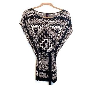 Black and white print top with black wrap